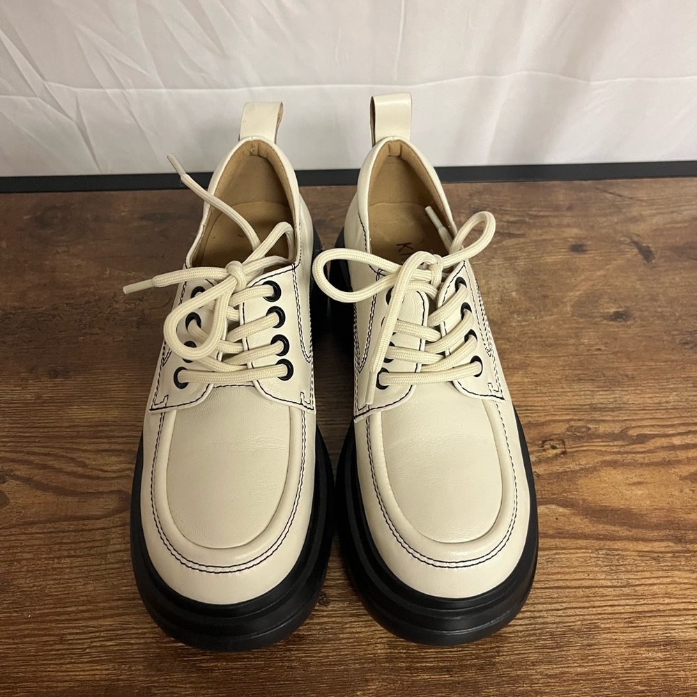 Kiss Cream and Black Leather Oxfords